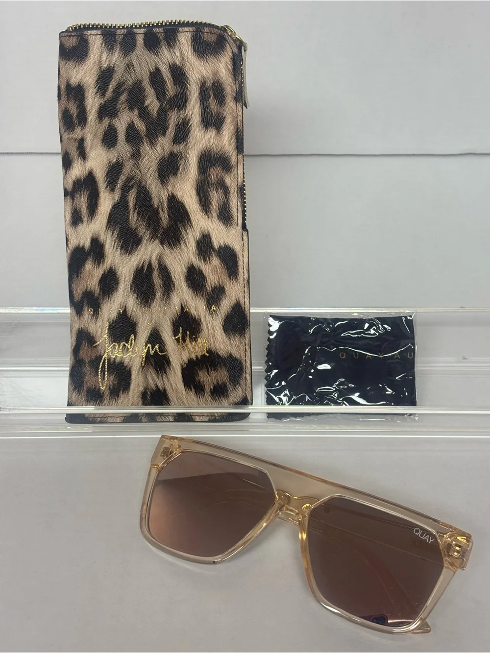 Quay Australia Transparent Brown Frame Sunglasses with Leopard Zip Case